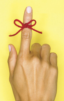 String tied on finger
